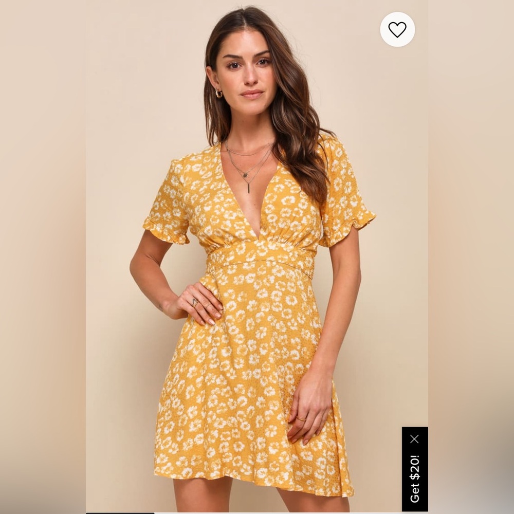 Mustard yellow floral mini dress.